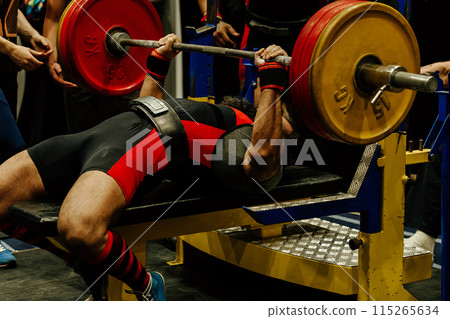 bench press indian athlete at powerlifting competition, barbell weight 150 kg bench press indian athlete at powerlifting competition, barbell weight 150 kg 115265634