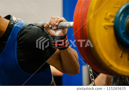 athlete powerlifter preparing squat exercise at powerlifting competition 115265635