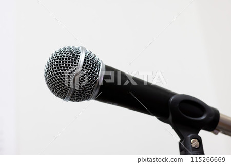 One dynamic microphone on a white solid background 115266669