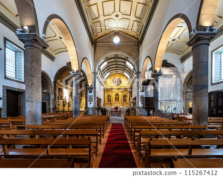 Interior of Faro Cathedral, Se Catedral in Faro, Algarve, Portugal. With walls finely decorated by azulejos tiles. Interior of Faro Cathedral, Se Catedral in Faro, Algarve, Portugal. With walls finely decorated by azulejos tiles. 115267412