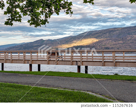 New wooden boardwalk along the waterfront on Okanagan lake New wooden boardwalk along the waterfront on Okanagan lake 115267616