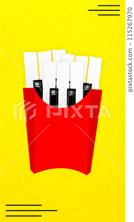 Fast Food Fantasia. French fry container with piano keys inside against bright yellow background. Contemporary art collage. 115267970