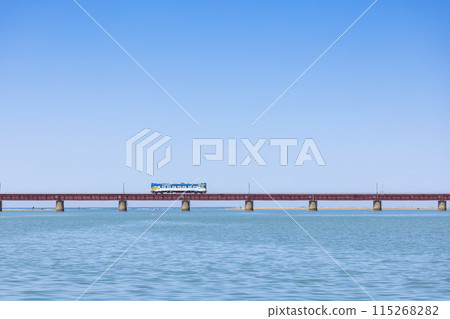 Train crossing the Yura River Bridge 115268282