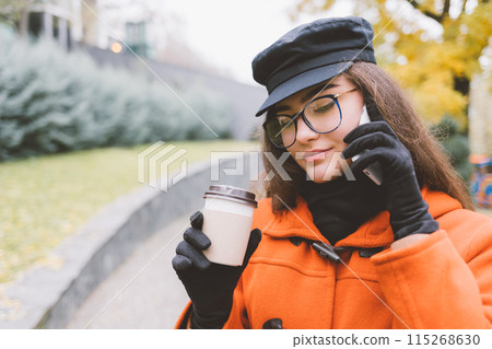 A woman in a black hat A woman in a black hat 115268630