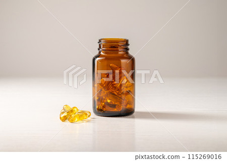 Capsule of omega 3, 6, 9 fish oil, vitamin isolated on white background. Capsule of omega 3, 6, 9 fish oil, vitamin isolated on white background. 115269016