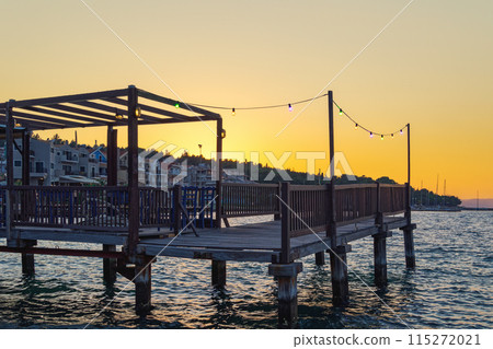 Empty tavern with outdoor seating area on the promenade of Argostoli Town in Kefalonia Ionian Island Greece. 115272021