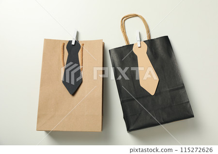 The concept of a gift for father's day, on a white background. The concept of a gift for father's day, on a white background. 115272626