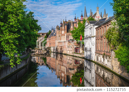 Scenery of the Dijver Canal in the historic center of Bruges, Belgium 115272735