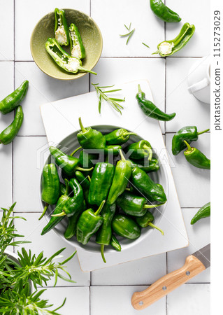 Fresh green Spanish Pimientos de Padron pepper, top view 115273029