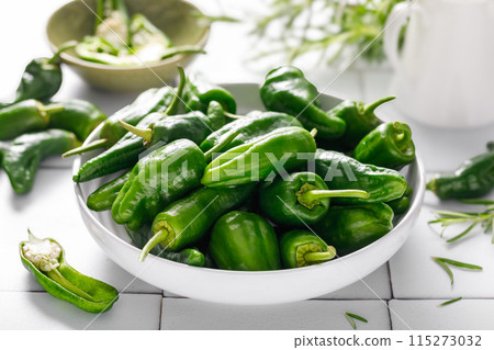 Fresh green Spanish Pimientos de Padron pepper, top view 115273032