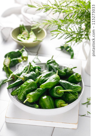 Fresh green Spanish Pimientos de Padron pepper, top view 115273033