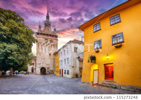 Amazing evening view of historic town Sighisoara and Clock Tower built by Saxons. 115273248