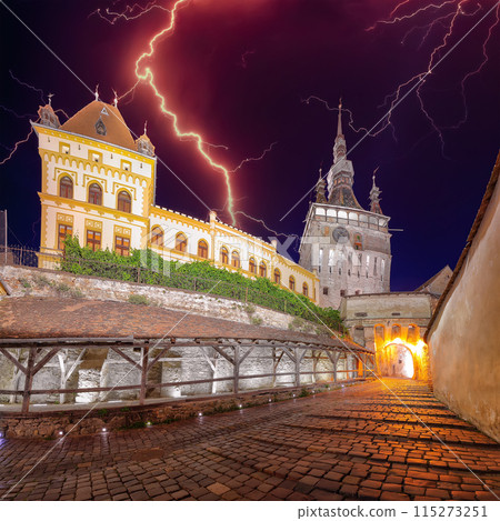 Amazing night view of historic town Sighisoara and Clock Tower built by Saxons. 115273251
