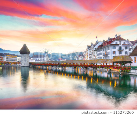 Breathtaking historic city center of Lucerne with famous buildings and old wooden Chapel Bridge (Kapellbrucke) Breathtaking historic city center of Lucerne with famous buildings and old wooden Chapel Bridge (Kapellbrucke) 115273260