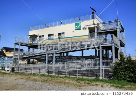 Tsunami evacuation towers protect lives from approaching tsunamis Tsunami evacuation towers protect lives from approaching tsunamis 115273486