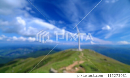Blur background of high mountain with blue sky and wind turbine. Energy. Spate. 115273981