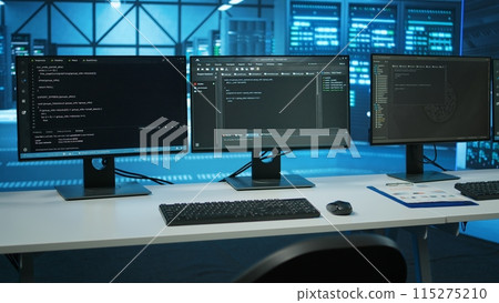 Lines of code running on computer screens in data center, used for troubleshooting rackmounts in server rows. Close up shot of script working on PC monitors upgrading hardware Lines of code running on computer screens in data center, used for troubleshooting rackmounts in server rows. Close up shot of script working on PC monitors upgrading hardware 115275210