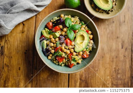 Healthy Avocado Chickpea Salad on Wooden Table 115275375