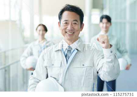Worker/Engineer doing a fist pump 115275731