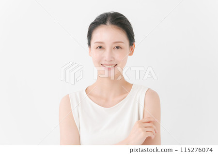 Photo of a woman smiling at the camera Photo of a woman smiling at the camera 115276074