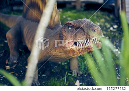 Dimetrodon is like a reptile, with curved hind legs and the lower part of the body pressed to the ground. With space to copy. High quality photo 115277282