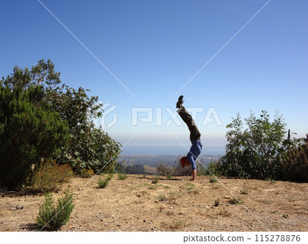 Man Handstands in the high mountains of Santa Barbara Man Handstands in the high mountains of Santa Barbara 115278876