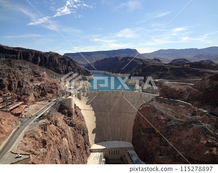 Aerial view of the Colorado River and Hoover Dam and road leading to dam 115278897