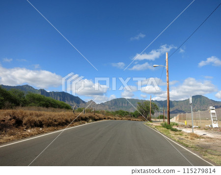 Long empty road in Maili Valley Long empty road in Maili Valley 115279814