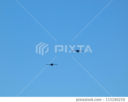 Two Fighter Jets fly in the air 115280258