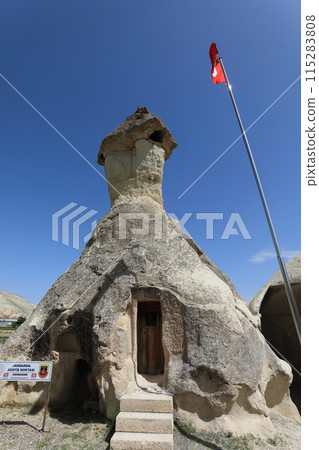 Mushroom rock tower near the entrance to Pasabag in Cappadocia 115283808