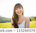 Woman smiling in natural light: Beauty image: hair care, skin care, body care, beauty salon: outdoors 115284379