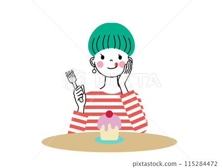 一個年輕女子帶著幸福的表情看著蛋糕 115284472