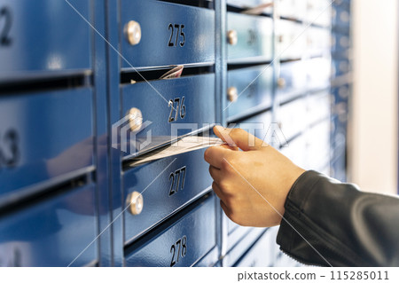 Mailbox in condominium house. Mail service  115285011