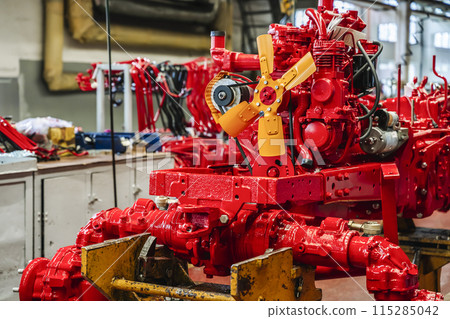 Tractor industry manufacture. New tractors on factory line. Production of agricultural machinery Tractor industry manufacture. New tractors on factory line. Production of agricultural machinery 115285042