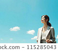 Businesswoman looking up at the sky: career advancement image 115285043
