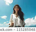 Smiling woman protecting herself from the summer sun: career advancement image 115285048
