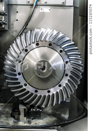 Production of gearbox gears. Metal gear part Production of gearbox gears. Metal gear part 115285074