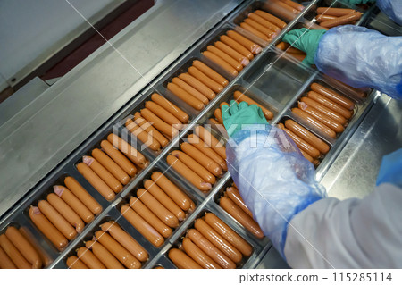 Production of meat sausages. Meat factory and industry. 115285114