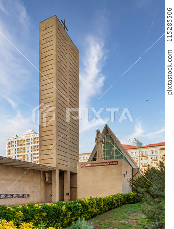 Exterior view of the Church of the Immaculate Conception in Baku, Azerbaijan, with tall tower and statue of Virgin Mary Exterior view of the Church of the Immaculate Conception in Baku, Azerbaijan, with tall tower and statue of Virgin Mary 115285506