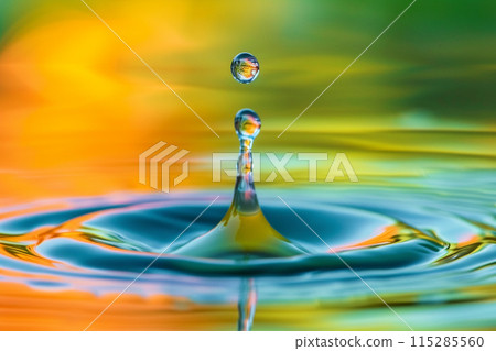 Falling water drop background 115285560