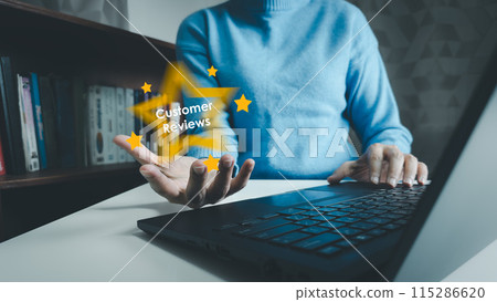 Satisfaction concept of customer, using laptop to express their opinions, answers and satisfied scores, client is satisfied with pressing smile face icon, excellent service, good feedback from user 115286620