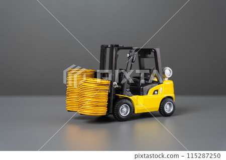 Forklift and stacks of coins. Increase income in export of goods. Trade traffic increasing. Production rise. Growing transportation prices. Growth in profits. High shipping rates. 115287250
