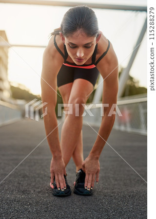 Fitness, woman and stretch legs on bridge for sports training or workout as athlete for health or wellness. Young, active female and warm up with sneakers for marathon with exercise or cardio in city 115288279