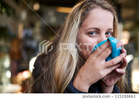 Portrait, drink or woman with coffee in cafe to relax, chill and enjoy a warm beverage in Netherlands. Cappuccino latte, smile or face of girl on break with tea, caffeine or hot chocolate in diner Portrait, drink or woman with coffee in cafe to relax, chill and enjoy a warm beverage in Netherlands. Cappuccino latte, smile or face of girl on break with tea, caffeine or hot chocolate in diner 115288661