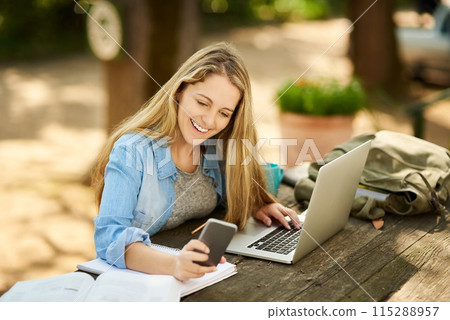 Woman, student and phone in park with laptop, books and happy for notification, scholarship or test results. Girl, e learning and education with smartphone, computer and smile for university project Woman, student and phone in park with laptop, books and happy for notification, scholarship or test results. Girl, e learning and education with smartphone, computer and smile for university project 115288957