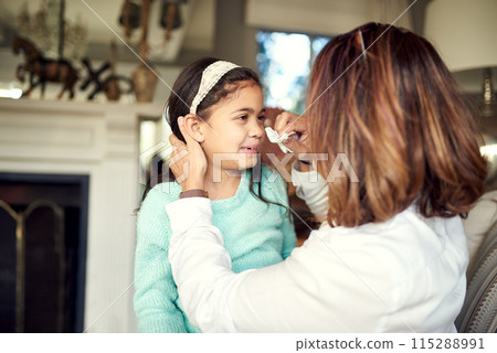 Girl, crying and mother wipe tears for bullying, frustrated and failing grades in house with school difficulties. Daughter, sad and mom with tissue for family conflict, angry and puberty in home 115288991