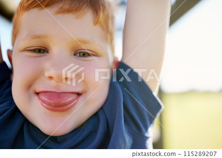 Portrait, boy and smile in park, monkey bars and happy with playing, outdoor and adventure, Child, playground and jungle gym or tongue out, obstacle course and active on vacation, holiday and games Portrait, boy and smile in park, monkey bars and happy with playing, outdoor and adventure, Child, playground and jungle gym or tongue out, obstacle course and active on vacation, holiday and games 115289207