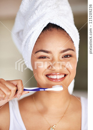 Smile, dental care and portrait of woman with toothbrush for morning hygiene routine in bathroom. Happy, wellness and female person with oral health product for plaque, gums and fresh breath at home. 115289236