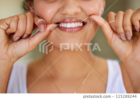 Smile, dental floss and mouth of woman with cleaning teeth for morning routine with health. Happy, dentistry and closeup of person with oral care product for hygiene treatment to prevent cavity. 115289244