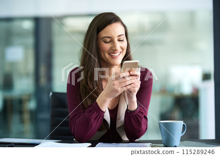 Business, typing and woman at desk, cellphone and social media with contact, text and internet. Employee, copywriting agency and journalist with smartphone, connection and digital app for online news 115289246